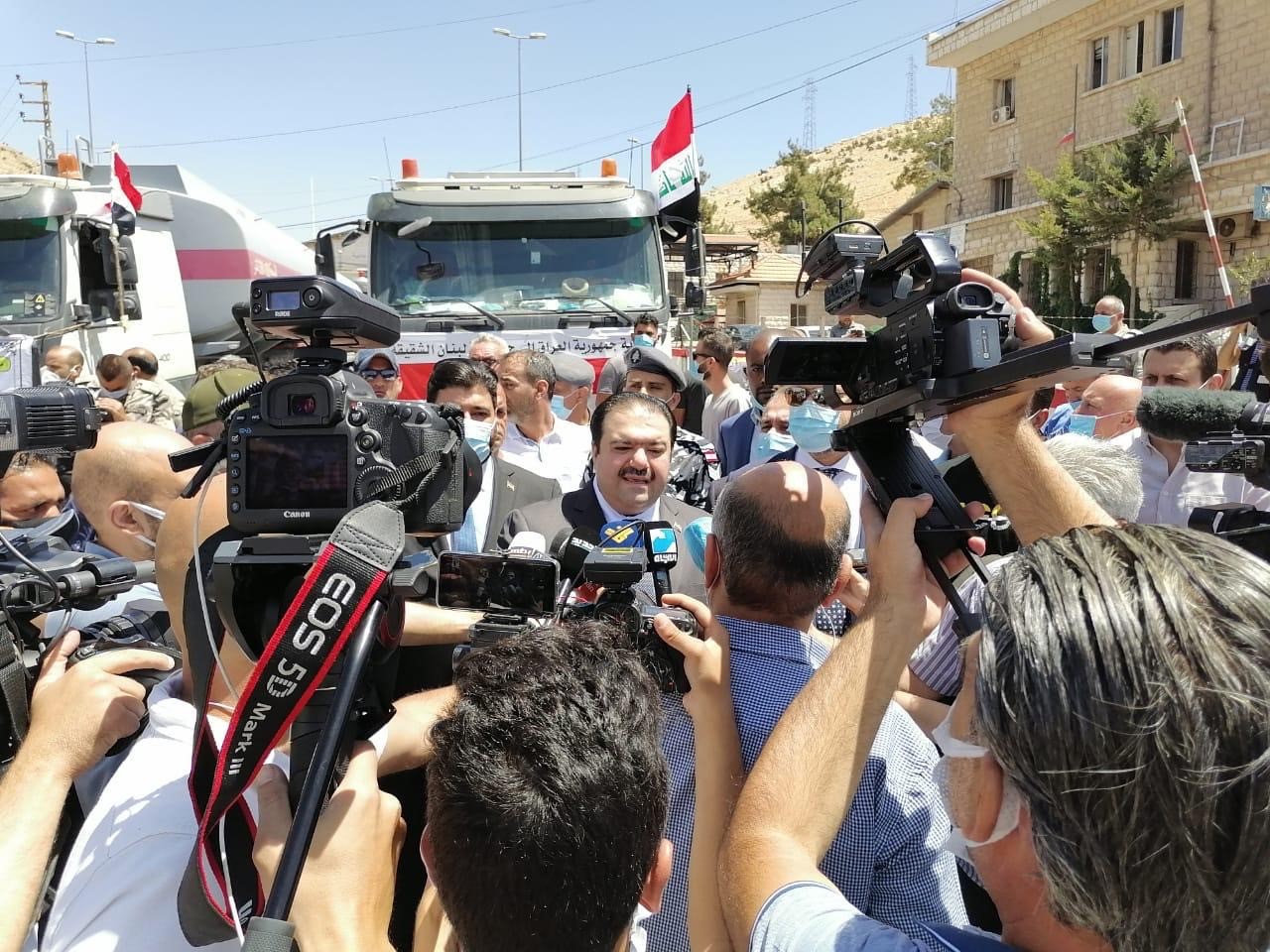 القائم بالأعمال العراقي أمين النصراوي ووزير الطاقة ريمون غجر